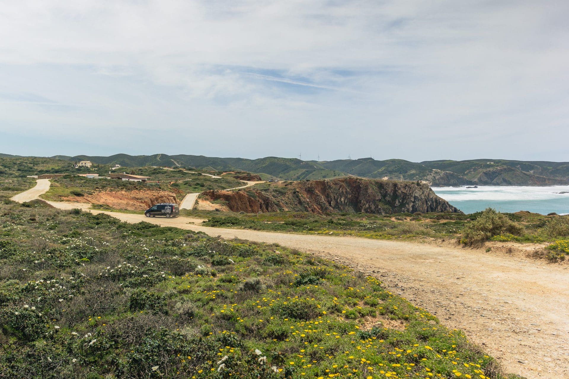 Algarve coast with rugged cliffs and ocean views, perfect for cycling adventures along Portugal’s so.