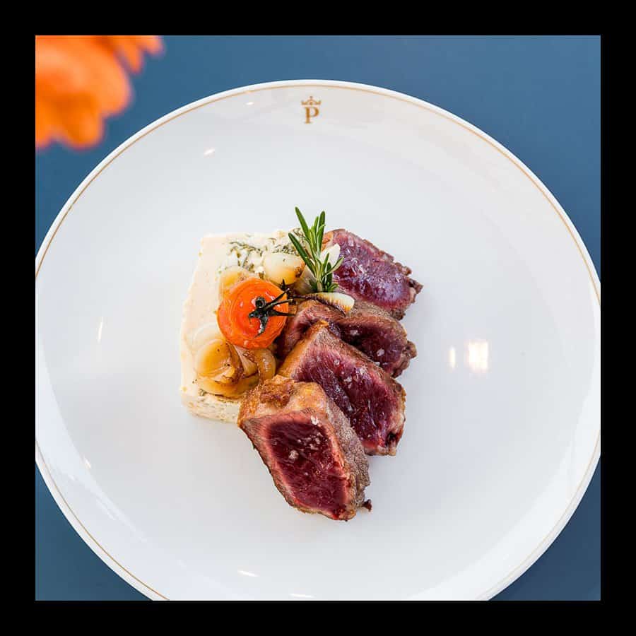 Gourmet steak with vegetables at Parador de Tui, Portugal.